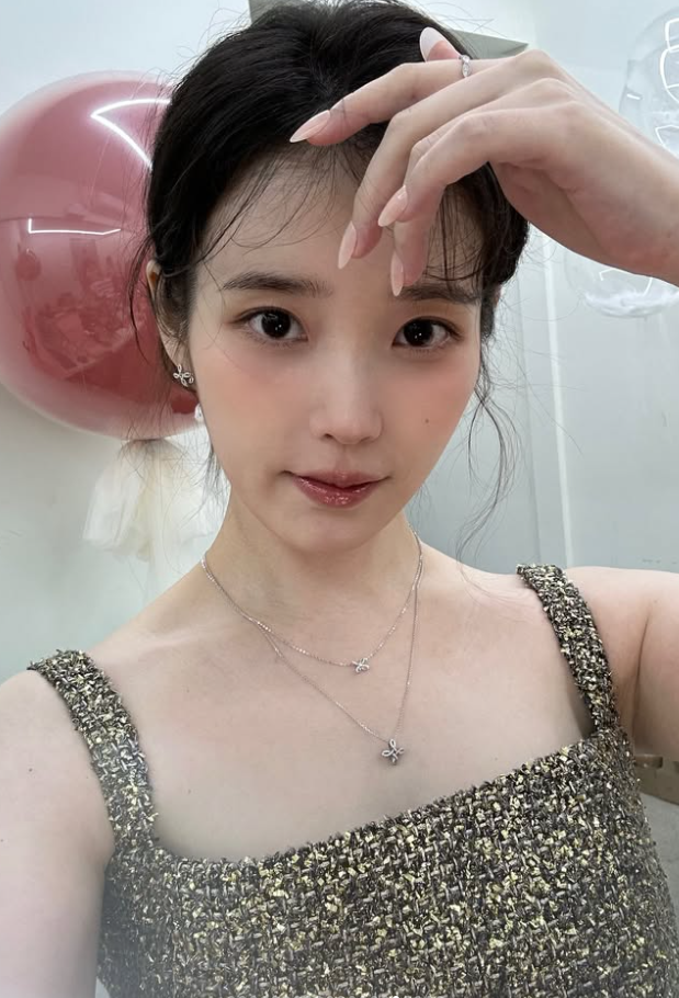 IU、イ・ジョンソクと破局後にチャン・ギハの曲を？SNSの選曲が波紋を呼ぶ
